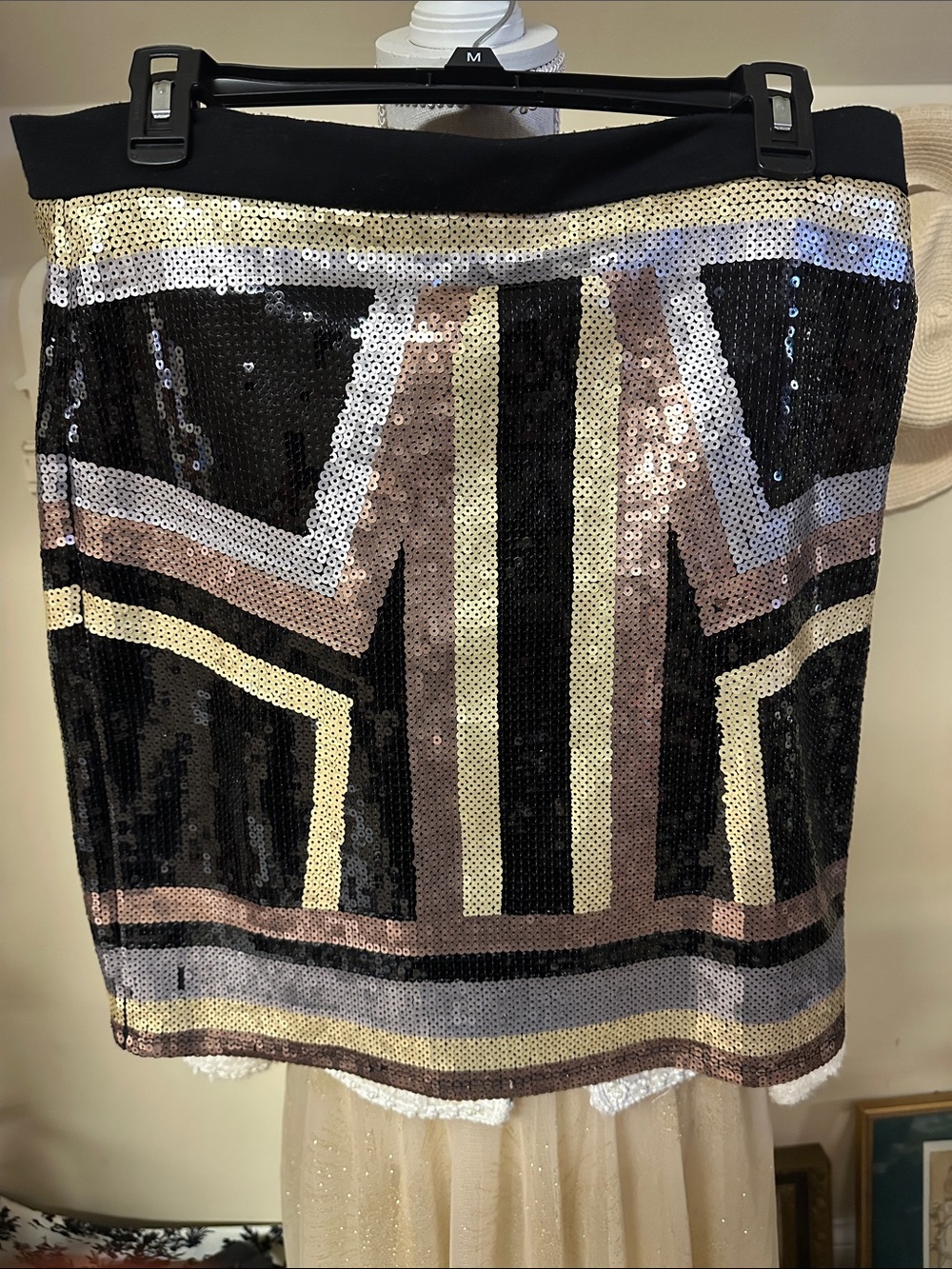 bebe Black Sequin Mini Skirt with Gold & Pink Accents